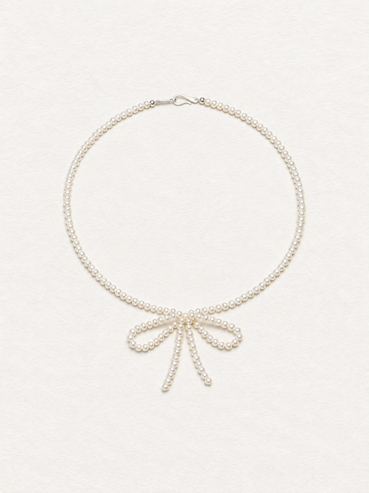 LUMERUNE Muse Pearl Bow Necklace — seed pearls forming a delicate bow
