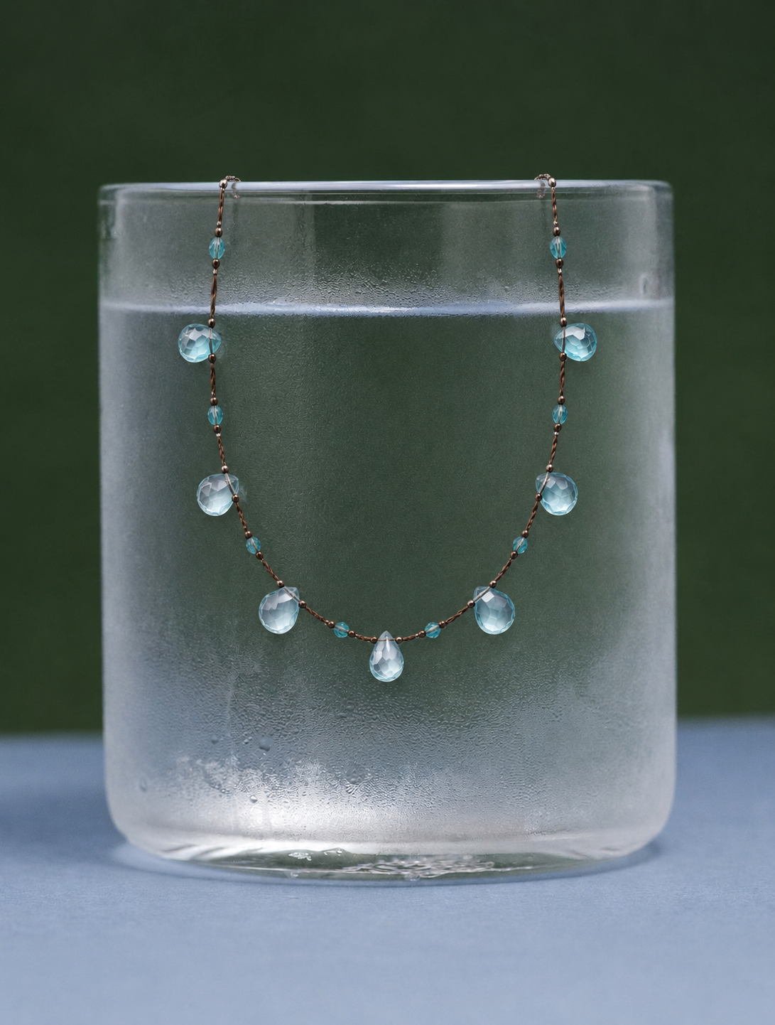 LUMERUNE Dewdrop Blue Topaz Necklace — blue topaz drops on a delicate cord