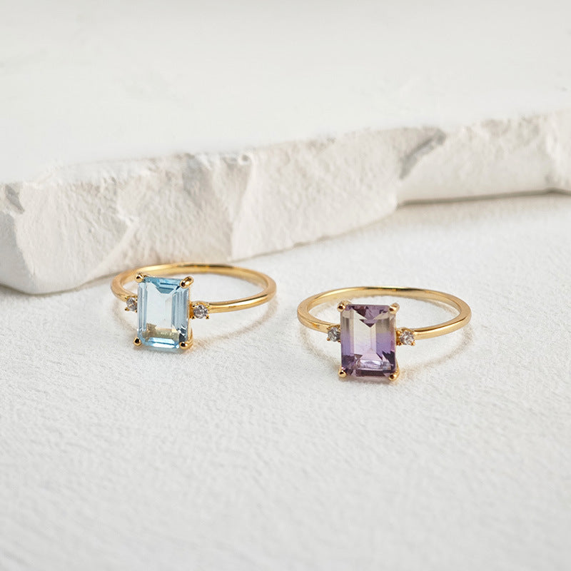 LUMERUNE Octagonal Blue Topaz Ring — octagonal blue topaz with white zircon accents