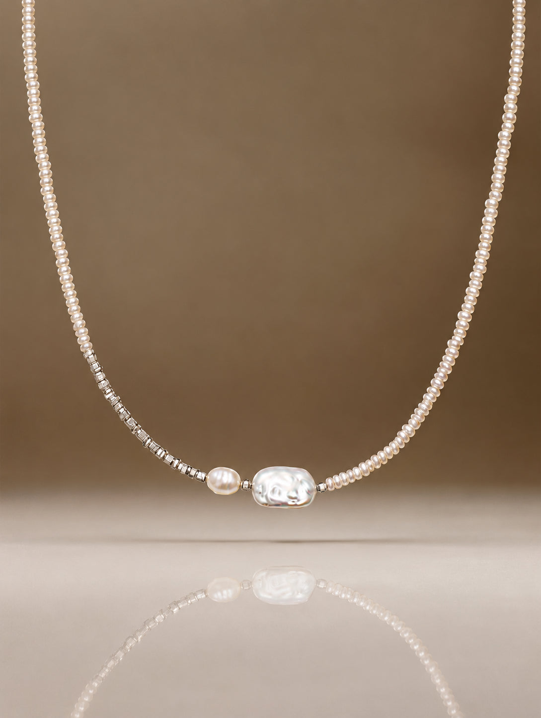 LUMERUNE Muse Pearl Necklace — seed pearls with a baroque pearl centerpiece