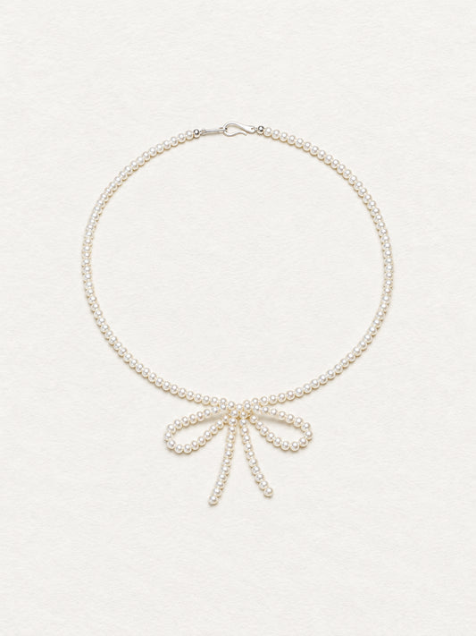 LUMERUNE Muse Pearl Bow Necklace — seed pearls forming a delicate bow