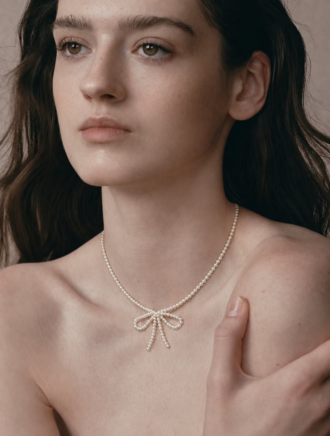 LUMERUNE Muse Pearl Bow Necklace — seed pearls forming a delicate bow