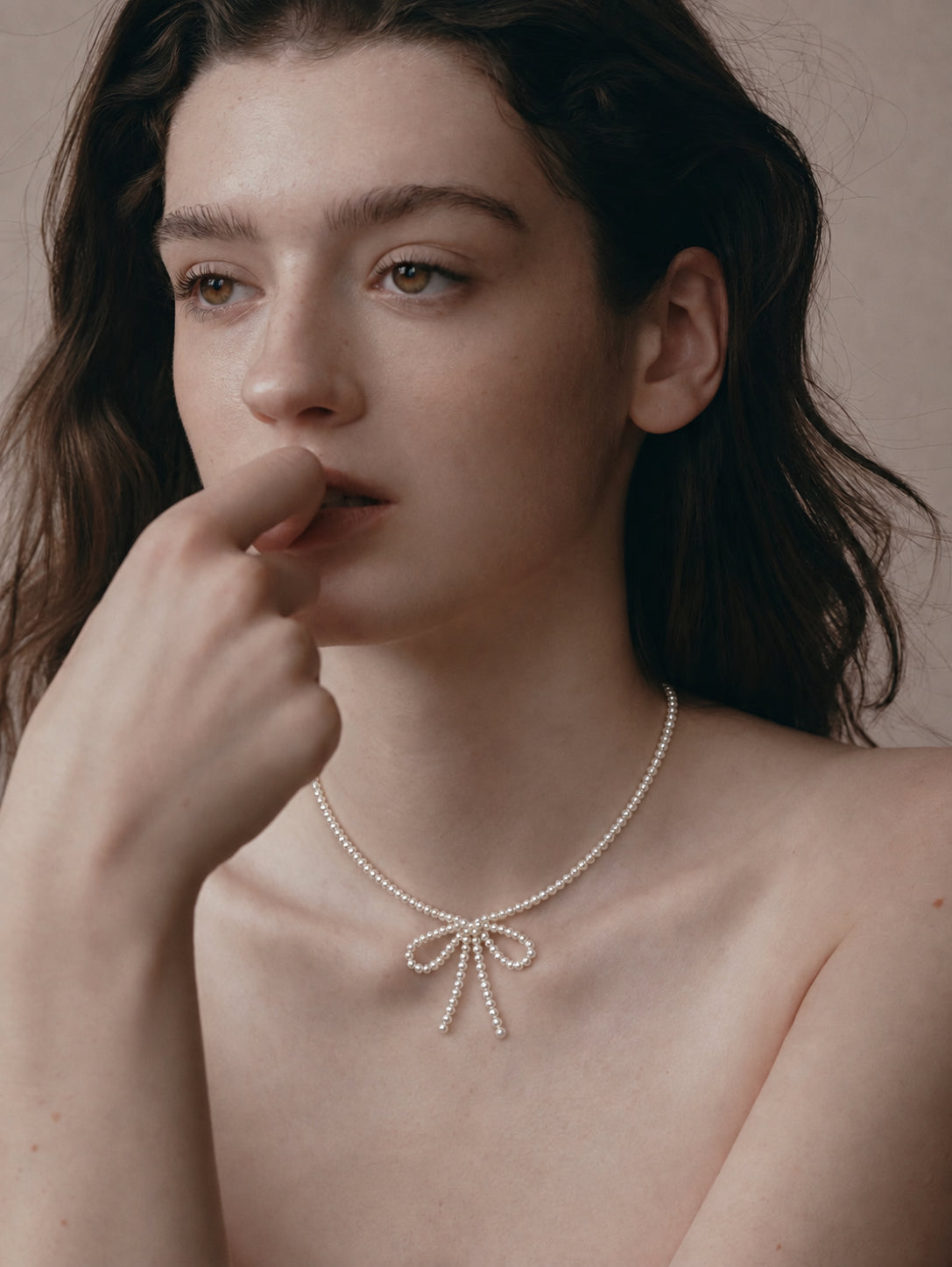 LUMERUNE Muse Pearl Bow Necklace — seed pearls forming a delicate bow