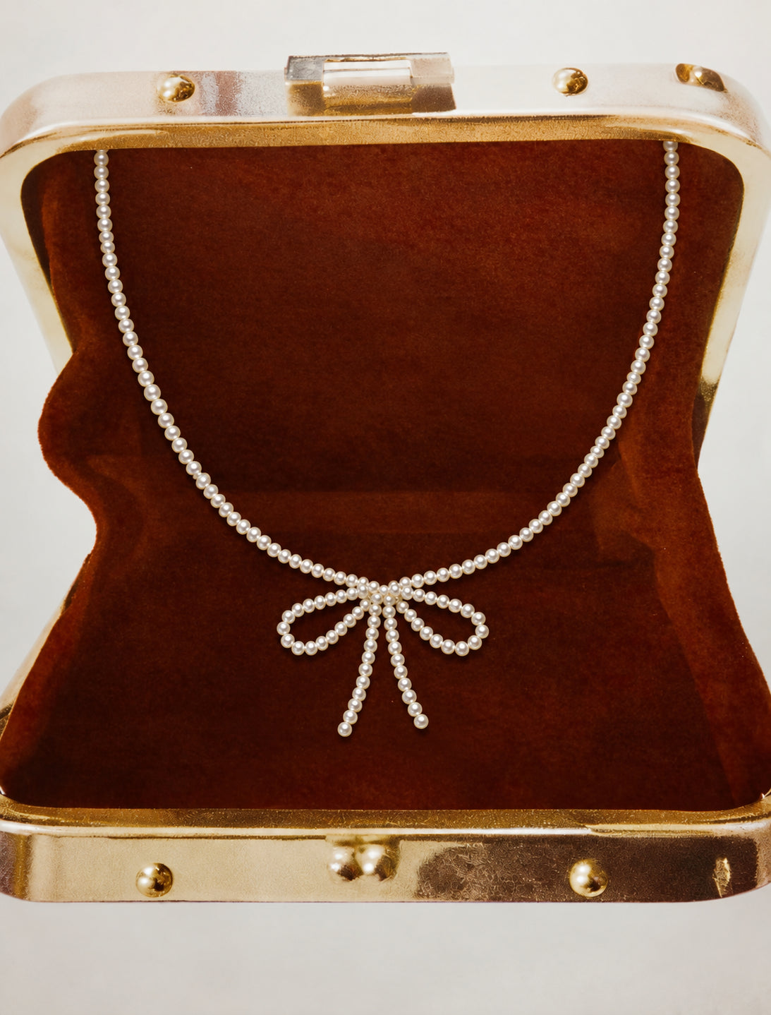 LUMERUNE Muse Pearl Bow Necklace — seed pearls forming a delicate bow