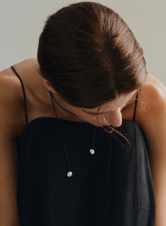LUMERUNE Nightfall Ribbon Lapis Lazuli Necklace With Pearl — tiny lapis lazuli beads and petal accents