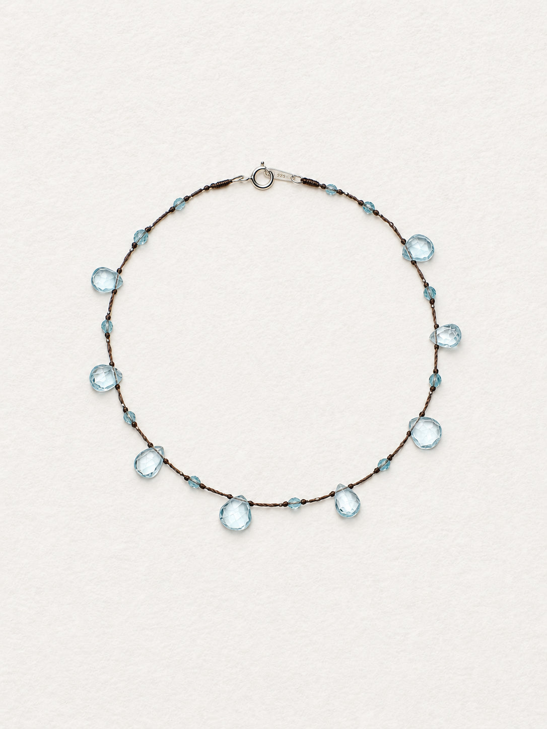 LUMERUNE Dewdrop Blue Topaz Necklace — blue topaz drops on a delicate cord