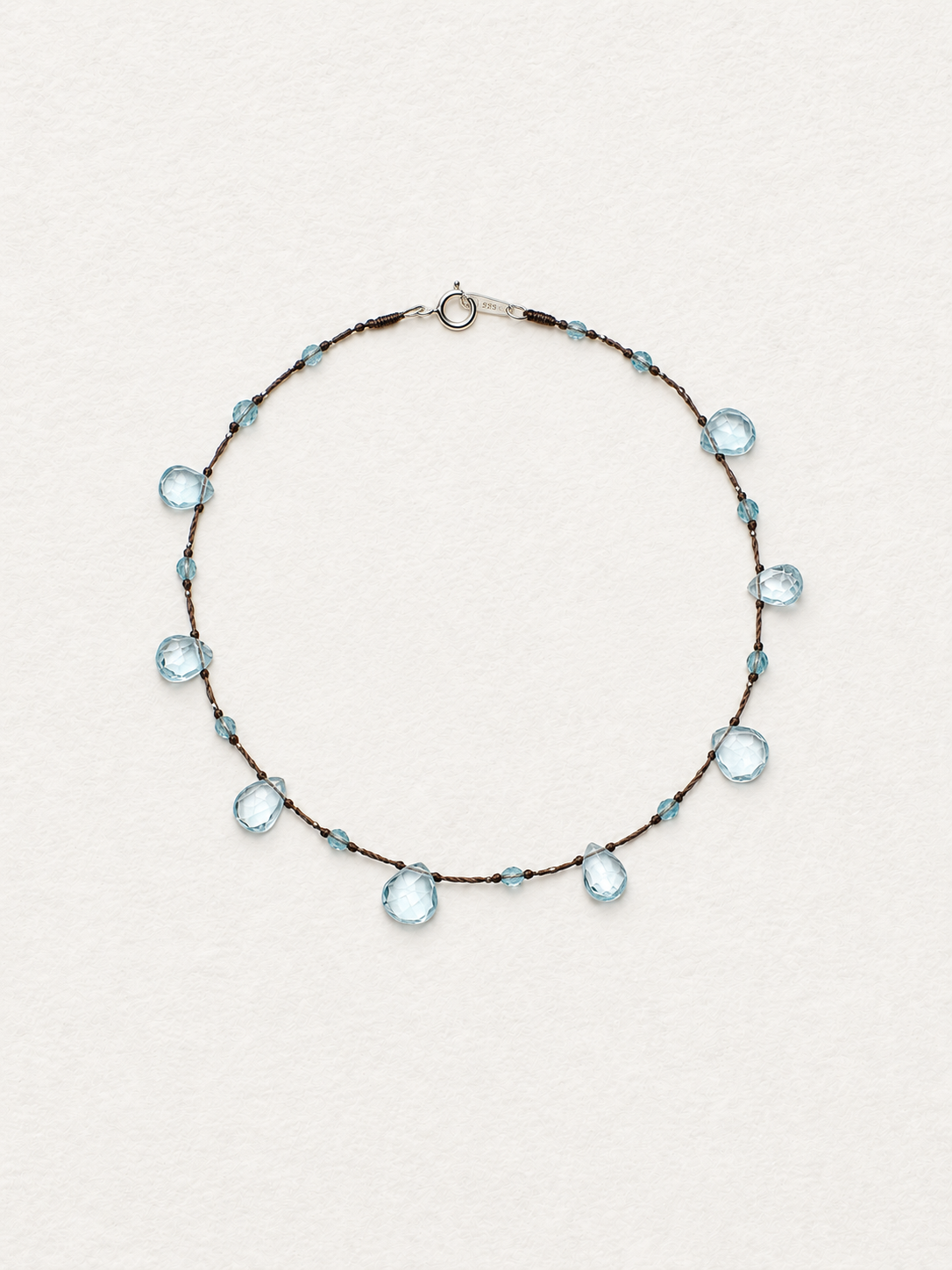 LUMERUNE Dewdrop Blue Topaz Necklace — blue topaz drops on a delicate cord