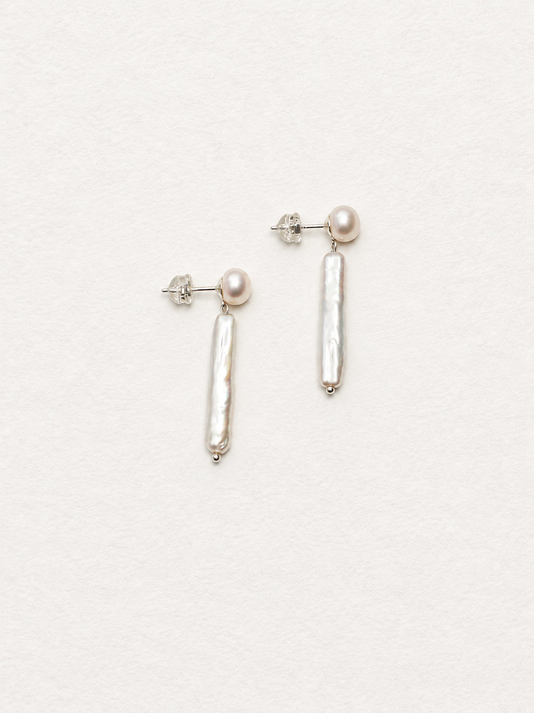 LUMERUNE Muse Pearl Drop Earrings — long freshwater pearls in a drop design
