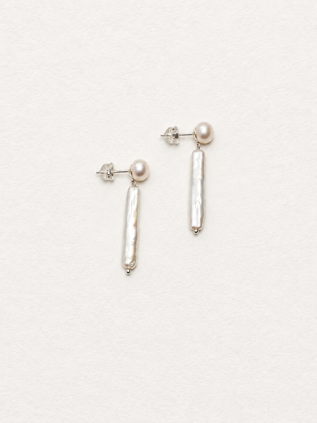 LUMERUNE Muse Pearl Drop Earrings — long freshwater pearls in a drop design