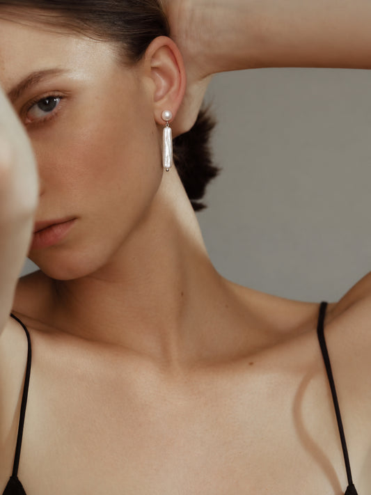 LUMERUNE Muse Pearl Drop Earrings — long freshwater pearls in a drop design