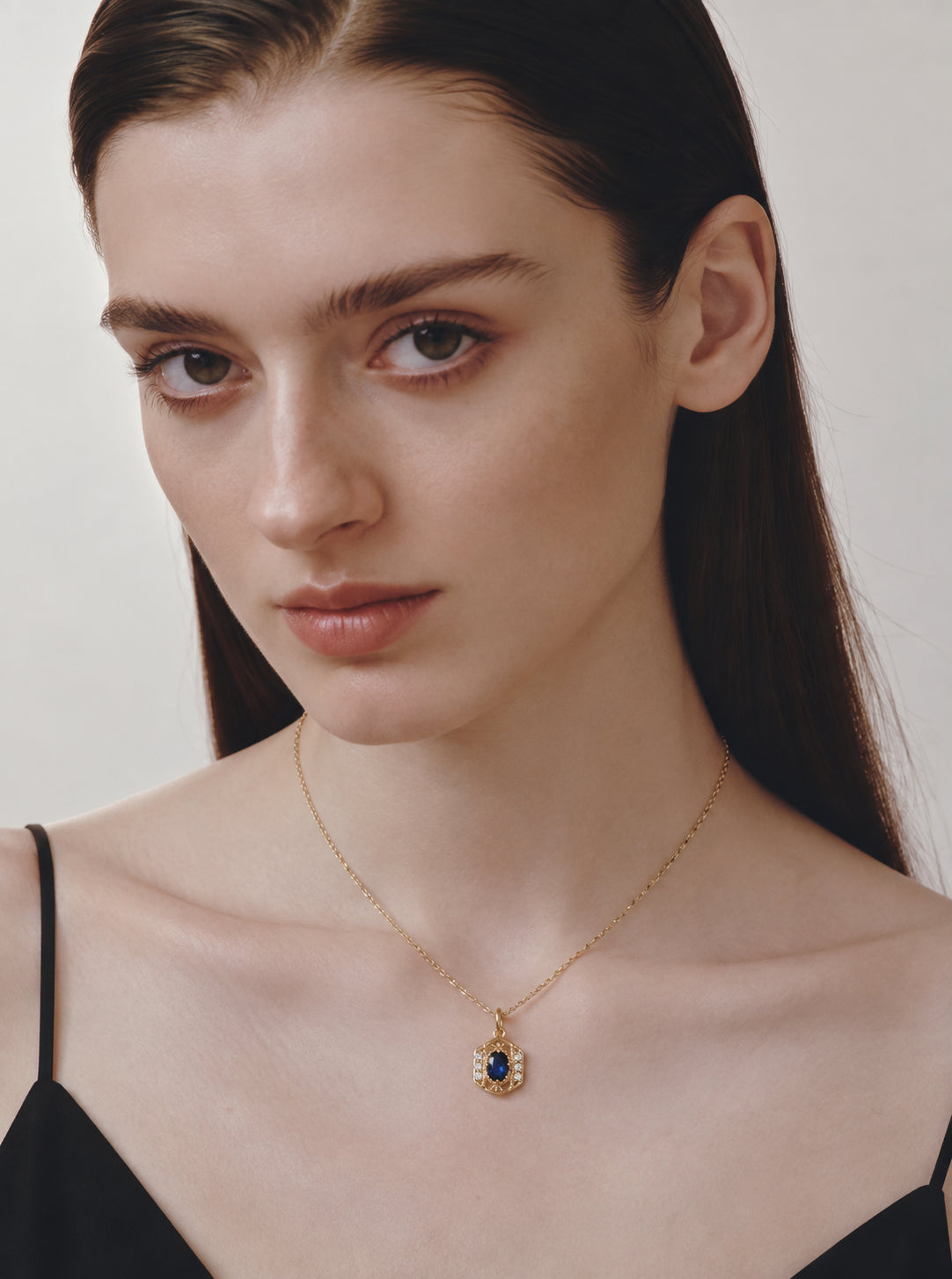 LUMERUNE Nocturne Crest Blue Sapphire Pendant — deep blue sapphire in vintage gold filigree