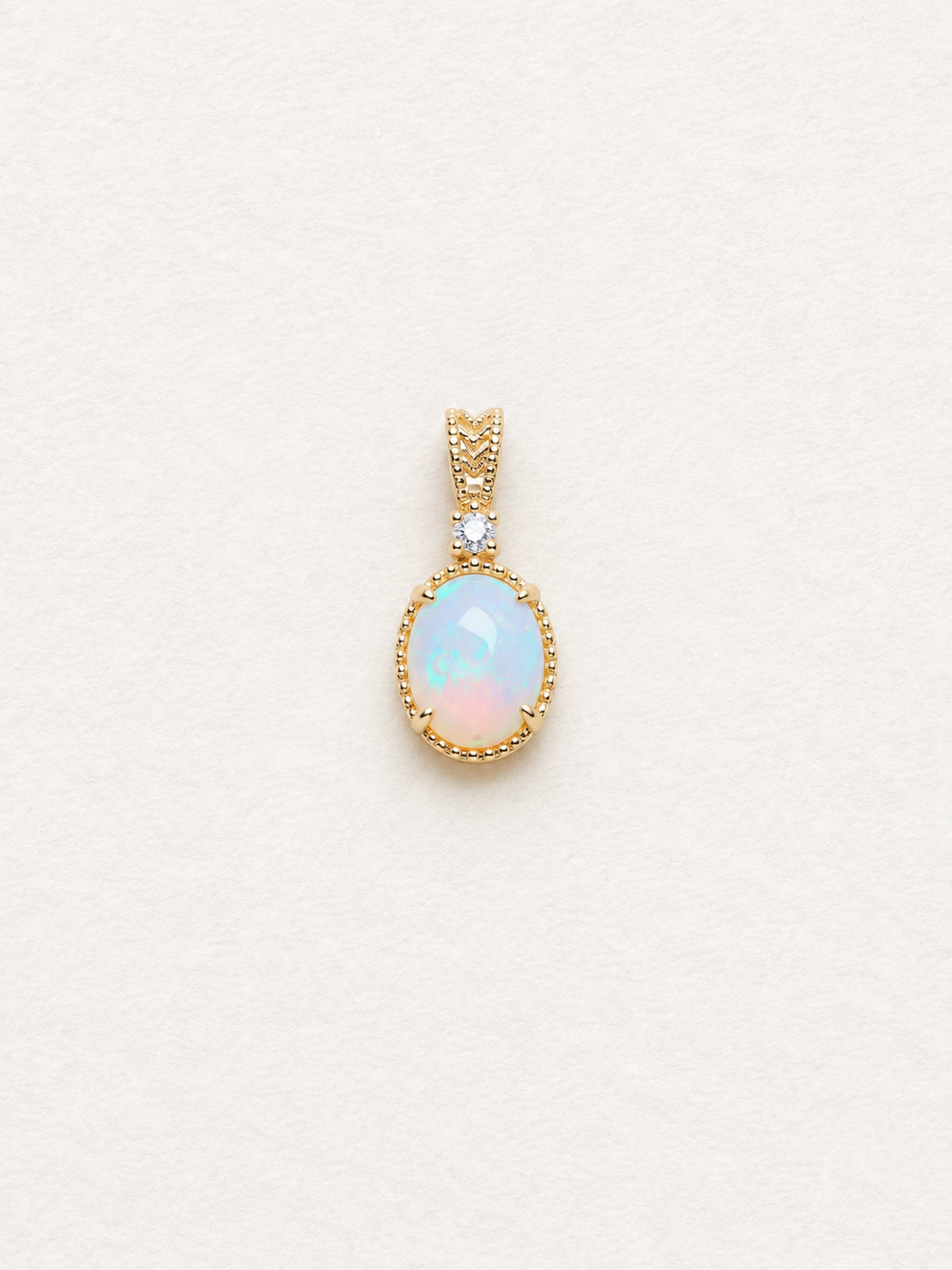 LUMERUNE Lunar Opal Starlight Pendant — oval opal in a gold toned setting with a white zircon