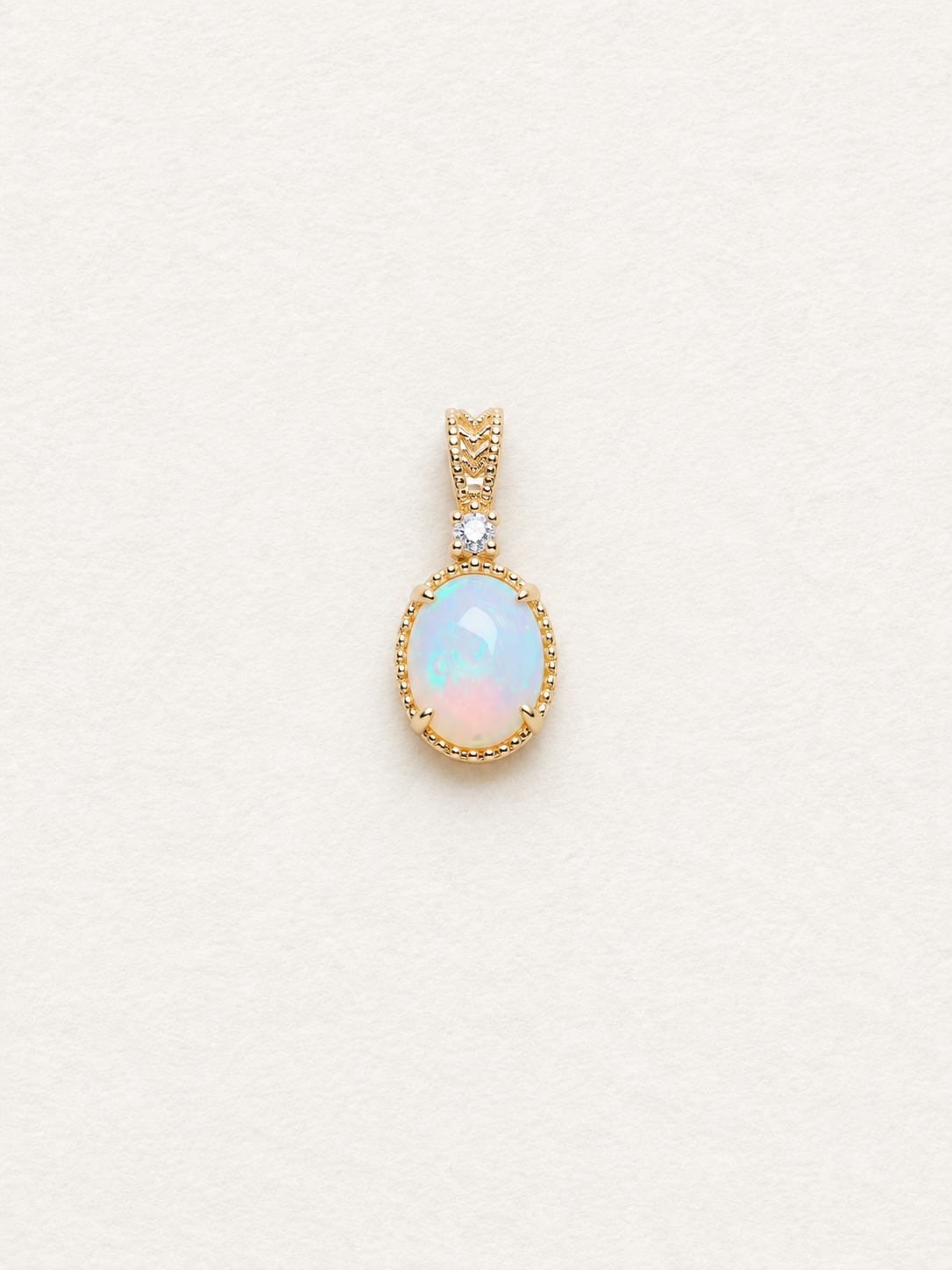LUMERUNE Lunar Opal Starlight Pendant — oval opal in a gold toned setting with a white zircon