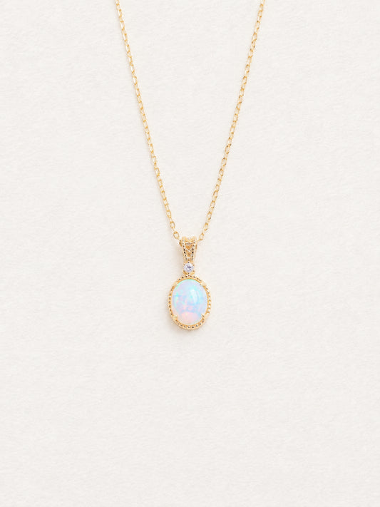 LUMERUNE Lunar Opal Starlight Pendant — oval opal in a gold toned setting with a white zircon