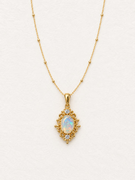 LUMERUNE Lunar Opal Iris Pendant — opal framed by gold toned iris petals