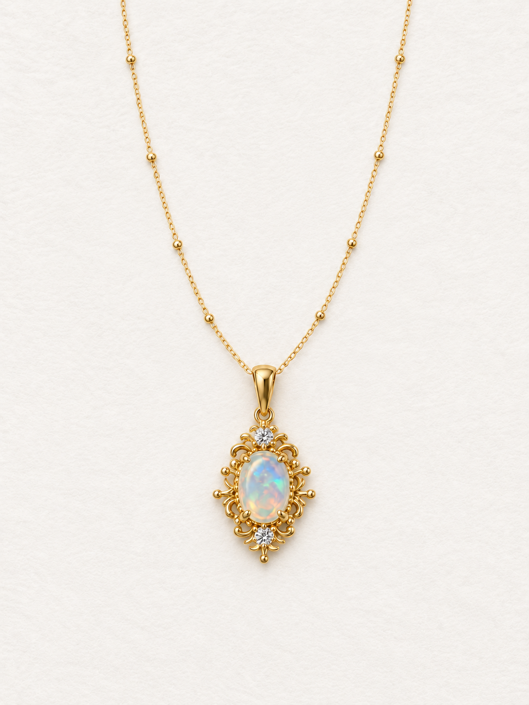LUMERUNE Lunar Opal Iris Pendant — opal framed by gold toned iris petals
