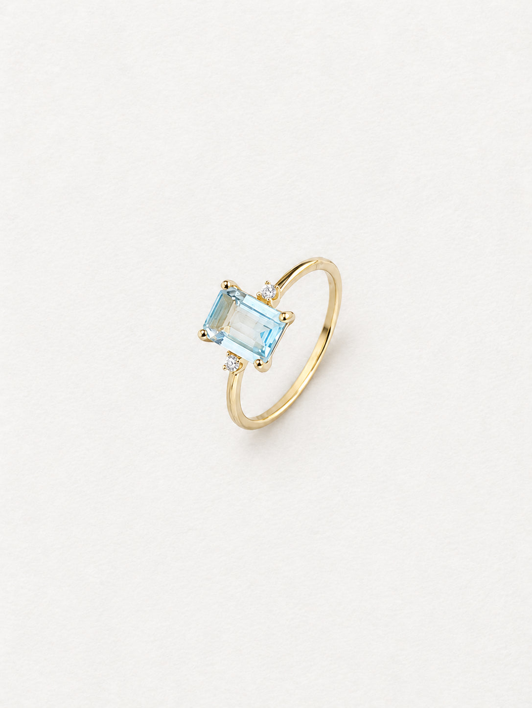 LUMERUNE Octagonal Blue Topaz Ring — octagonal blue topaz with white zircon accents