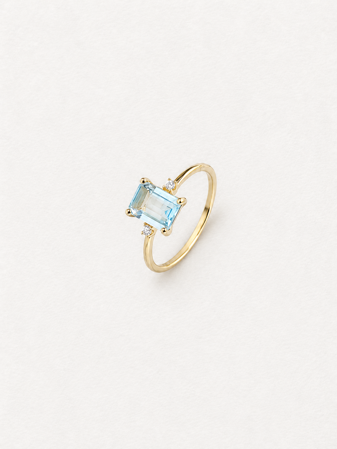 LUMERUNE Octagonal Blue Topaz Ring — octagonal blue topaz with white zircon accents