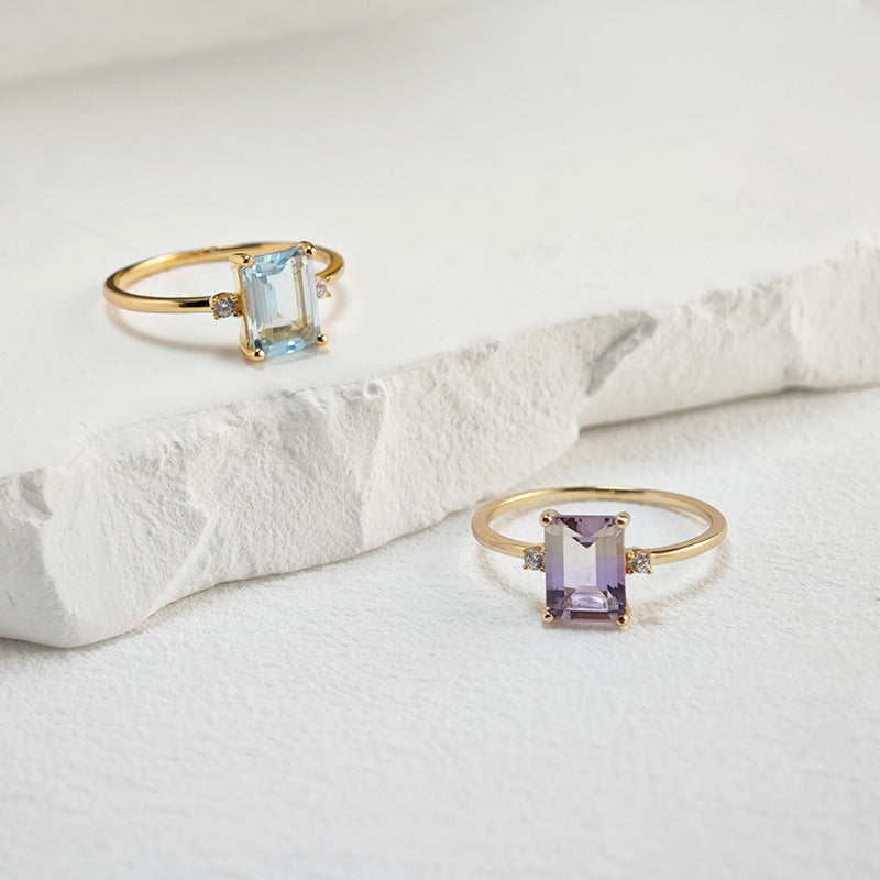 LUMERUNE Octagonal Blue Topaz Ring — octagonal blue topaz with white zircon accents